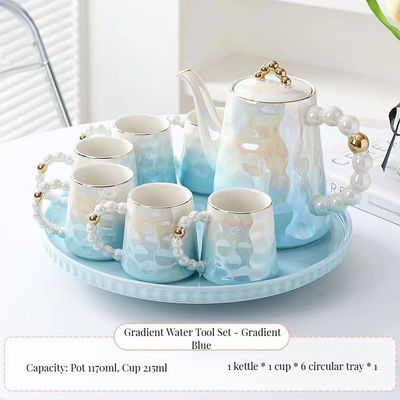 Modern Luxury Pink Ceramic Tea Cup Set with Shell Design and Saucer for Afternoon Tea