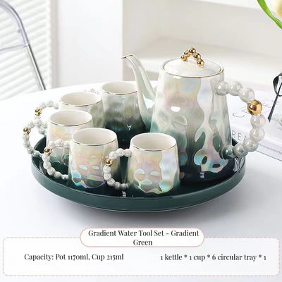 Modern Luxury Pink Ceramic Tea Cup Set with Shell Design and Saucer for Afternoon Tea