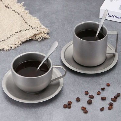 Enjoy Your Coffee in Luxury with this Ceramic Cup Set and Stainless Steel Spoon Tray