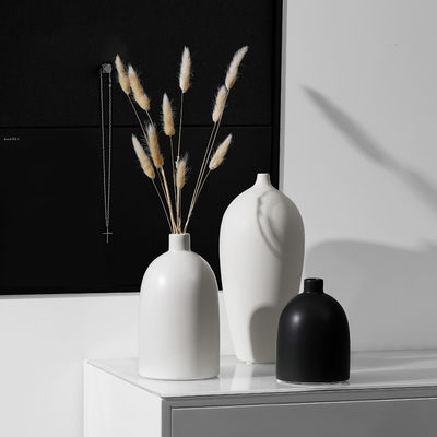 Add a Touch of Sophistication to Your Home with this Ceramic Vase in Black and White