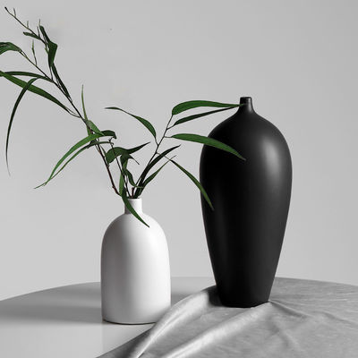 Add a Touch of Sophistication to Your Home with this Ceramic Vase in Black and White