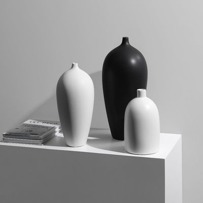 Add a Touch of Sophistication to Your Home with this Ceramic Vase in Black and White