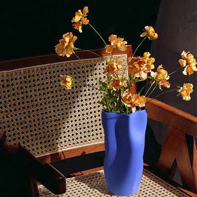 Create a Chic and Modern Atmosphere with This Unique Paper Basket Shaped Ceramic Vase