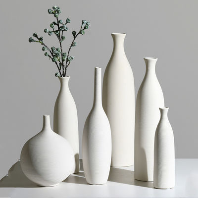 Add a Touch of Sophistication to Your Home with this White Ceramic Tabletop Vase