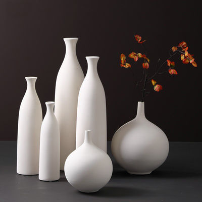 Add a Touch of Sophistication to Your Home with this White Ceramic Tabletop Vase