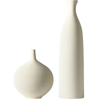 Add a Touch of Sophistication to Your Home with this White Ceramic Tabletop Vase