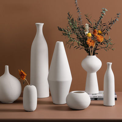 Add a Touch of Sophistication to Your Home with this White Ceramic Tabletop Vase
