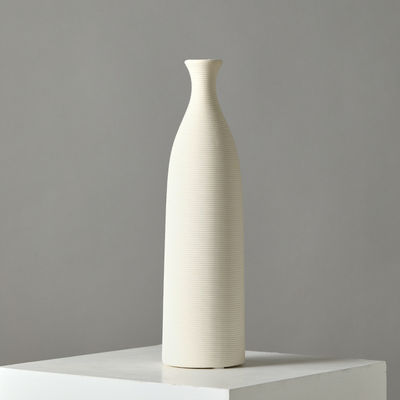 Add a Touch of Sophistication to Your Home with this White Ceramic Tabletop Vase