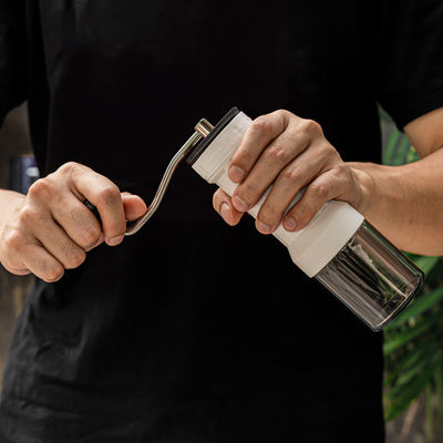 Modern Design Handheld Coffee Grinder with Customized Color and Portable Plastic Body