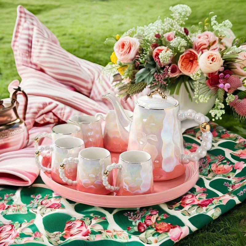 Modern Luxury Pink Ceramic Tea Cup Set with Shell Design and Saucer for Afternoon Tea